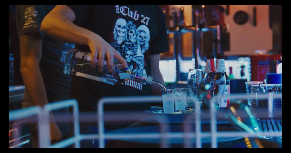 4 - Barman serving drink at Club 27