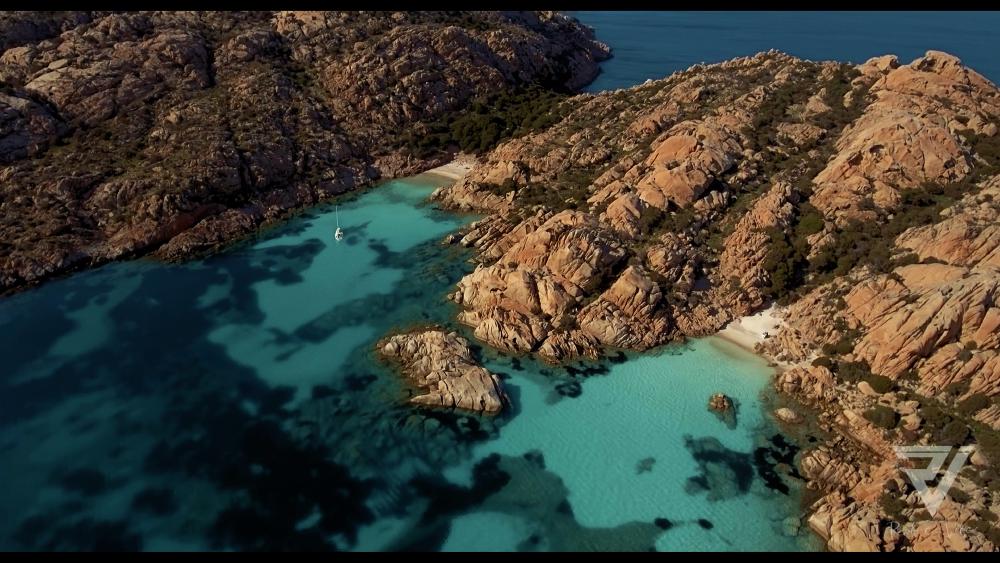 8 - Cala Coticcio full drone panorama with beautiful sea