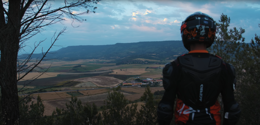 8 - biker contemplating landscape